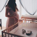 crib-mattress-dimensions-size-chart-image-showing-pregnant-woman-with-a-perfect-sized-crib-mattress